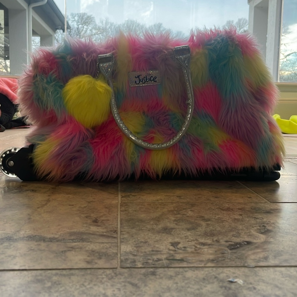 Justice rainbow bag with light up wheels